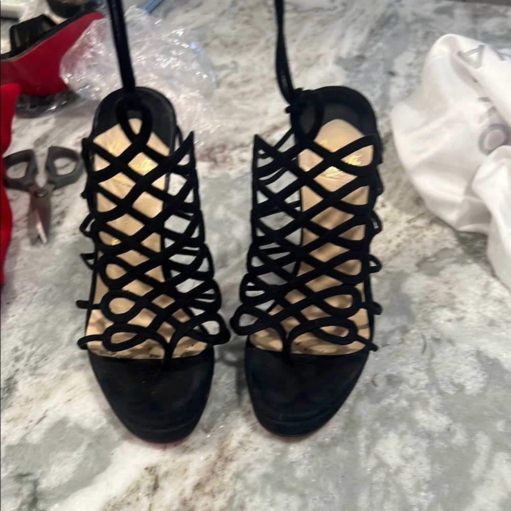 Christian Louboutin’s Black Strappy Women's Heels